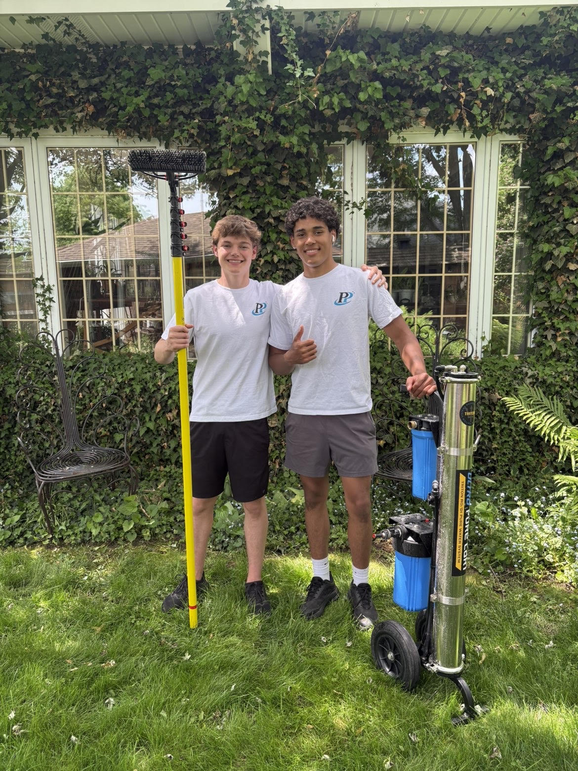 The Prestige Pane Cleaning team with pure-water pole and filtration system